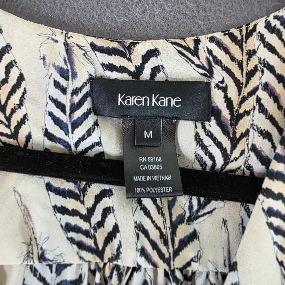 Karen Kane Womens M Feather Print Chiffon Blouse Tan Blue V-Neck Bell Sleeve